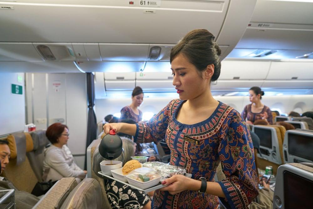 Flying Singapore Airlines Economy Class on SQ 401 from New Delhi to Changi? Read this detailed review covering comfort, meals, service, Boeing 787-10 experience, and tips for traveling with family